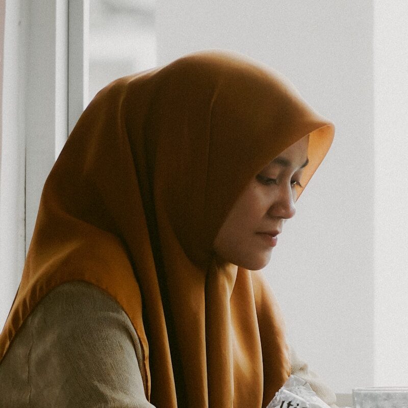 a woman sitting at a table